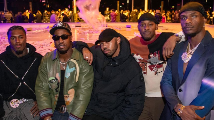 Kyle Smith, NFL fashion editor, with NFL players: D'Anthony Bell of the Cleveland Browns; his teammate Ogbo Okoronkwo; Joshua Kalu of the Titans; and Marquez Valdes-Scantling of the New Orleans Saints, after the KidSuper Fall 2025 Menswear Collection show in Paris.