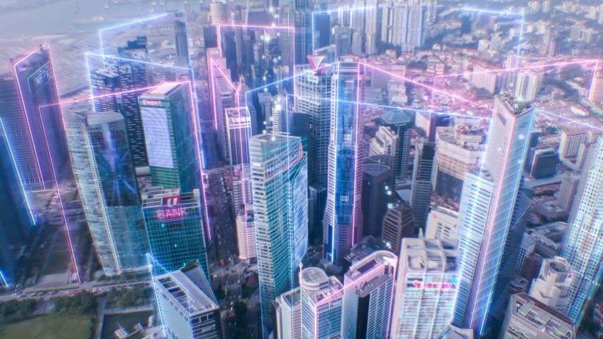 Cidade inteligente e conceito de metaversos, luzes neon futuristas em movimento com vista aérea de uma paisagem urbana moderna para conceito de tecnologia de conexão de rede de dados, conceito de tecnologia descentralizada em blockchain, conceito de tecnologia de comunicação global (Foto: Getty Images/Reprodução)