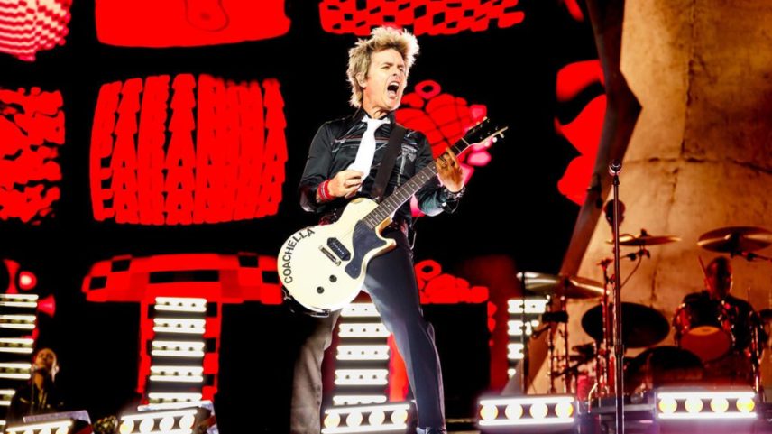 Um fã do Green Day que foi convidado ao palco para tocar "Good Riddance" em vez disso começou a tocar "Wonderwall" do Oasis, trollando Billie Joe Armstrong. (Foto: Reprodução)