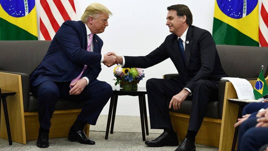 Donald Trump e Jair Bolsonaro, em foto de 2019 (Foto: Brendan Smialowski / AFP Photo)