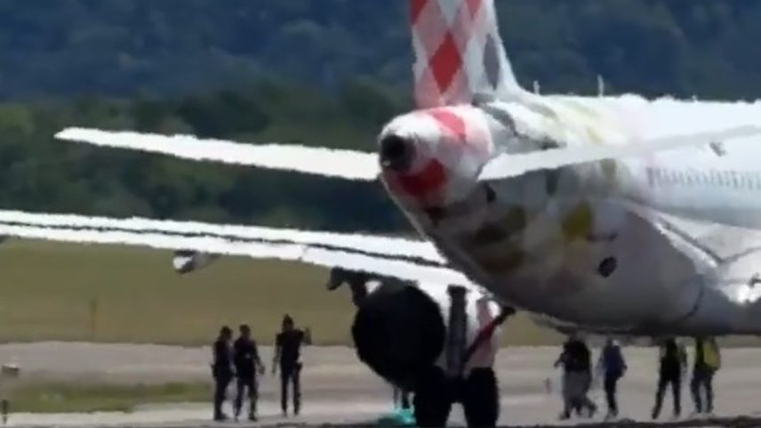Agentes atuam na pista do Aeroporto de Milão (Foto: Reprodução)