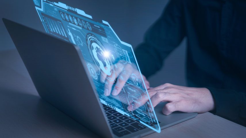 Empresário e conexão de rede de tecnologia da computação em tela virtual futurista de inteligência artificial (Foto: Vithun Khamsong/Getty Images)