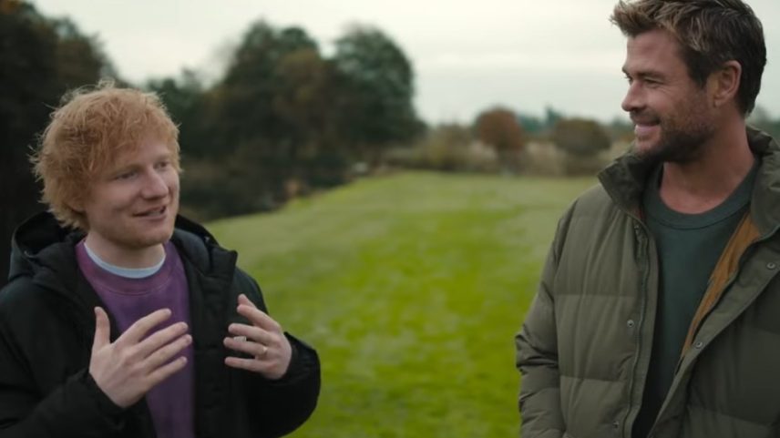 Ed Sheeran treina Chris Hemsworth para tocar bateria em um concerto ao vivo no trailer de 'Limitless' para a nova temporada. (Foto: Reprodução)