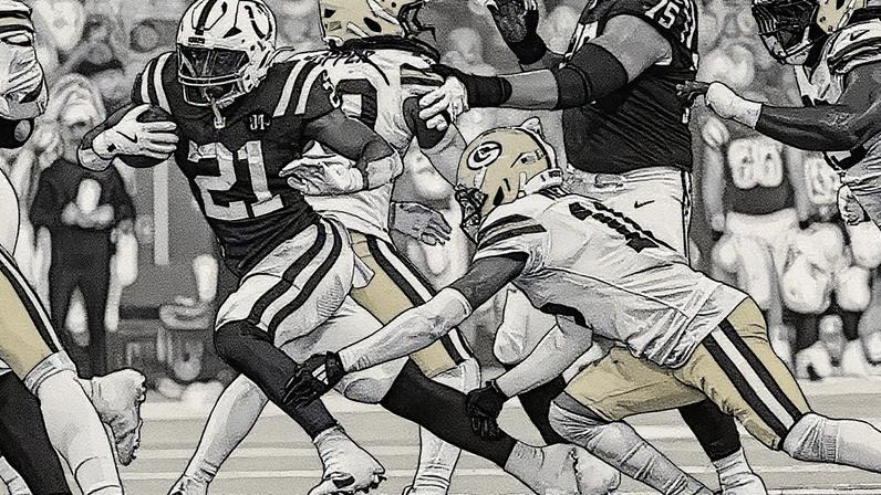 DJ Giddens #21 do Indianapolis Colts corre com a bola enquanto Bo Melton #16 do Green Bay Packers tenta o tackle durante o jogo de pré-temporada da NFL de 2025 entre Green Bay Packers e Indianapolis Colts no Lucas Oil Stadium em Indianápolis, Indiana (Foto: Reprodução)