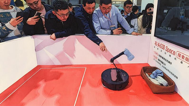 A Roborock lançou em 2025 um aspirador de pó com um braço robótico para mover meias e outros obstáculos para o lado. (Foto: Future Publishing/Getty Images)