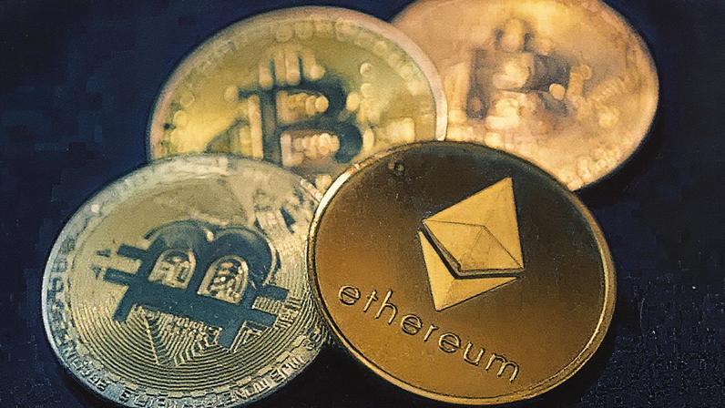 Ether e bitcoin. (Foto: Yuriko Nakao | Getty Images)
