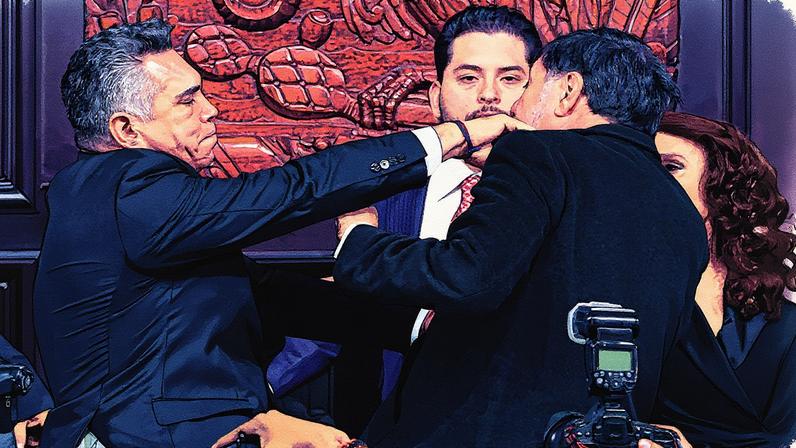 Senadores mexicanos Alejandro Moreno (esquerda) e Gerardo Fernandez Noroña (direita) trocam socos após debate sobre os EUA (Foto: AFP)