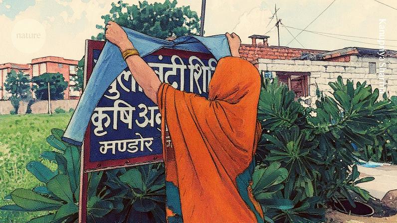Uma mulher pendura uma peça de roupa sobre uma placa em uma prisão aberta perto de Jodhpur, no noroeste da Índia, onde Kanupriya Sharma conduziu entrevistas para seu trabalho de doutorado. (Foto: Kanupriya Sharma)
