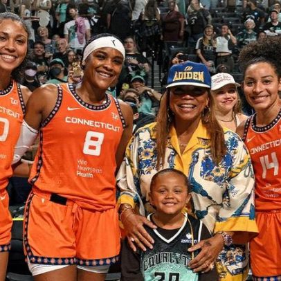 Rebel, filho de Queen Latifah, se diverte em jogo da WNBA