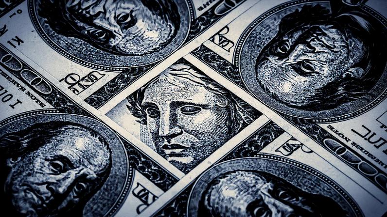 Dólar e real (Foto: RHJ/Getty Images)