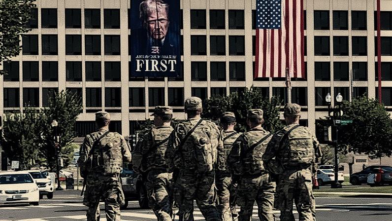 Soldados da Guarda Nacional passam em frente ao Departamento de Trabalho em Washington, nesta terça-feira. (Foto: Reprodução)