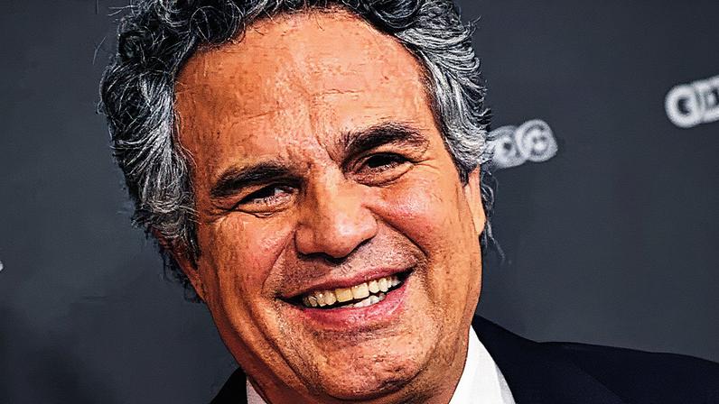 Homem em pé, posando para a foto, com cabelo castanho e barba, usando uma camisa preta (Foto: Reprodução)