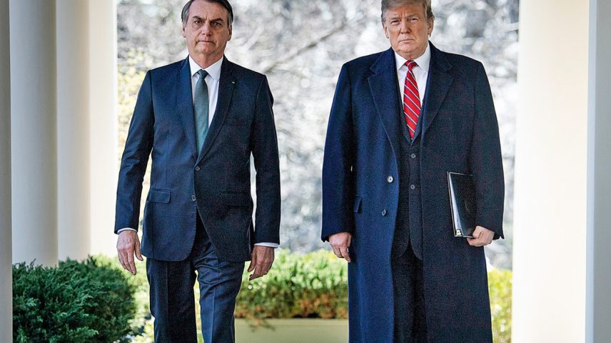 Presidente Jair Bolsonaro e presidente dos EUA, Donald Trump, na Casa Branca, em Washington. 19/03/2019 (Foto: Brendan Smialowski/AFP)