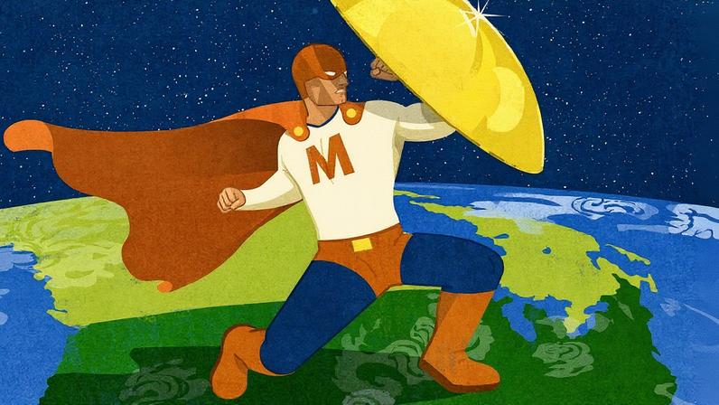 Figura de um super-herói com um M no peito segurando um escudo dourado contra 3 mísseis enquanto está em pé no planeta Terra (Foto: Reprodução)
