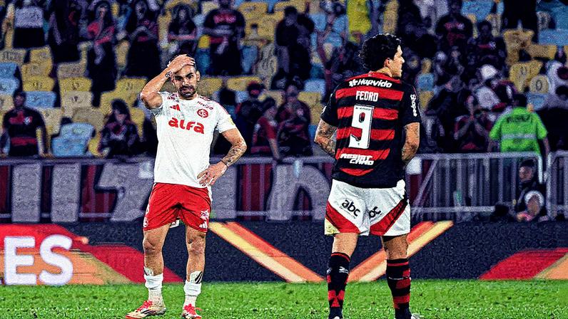 Bruno Henrique, do Internacional, e Pedro, do Flamengo, após jogo de ida das oitavas de final da Libertadores, no Maracanã, vencido pelo rubro-negro por 1 a 0 (Foto: Mauro Pimentel - 13.ago.25/AFP)