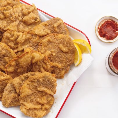 Descubra a origem e receitas do famoso filé empanado à milanesa