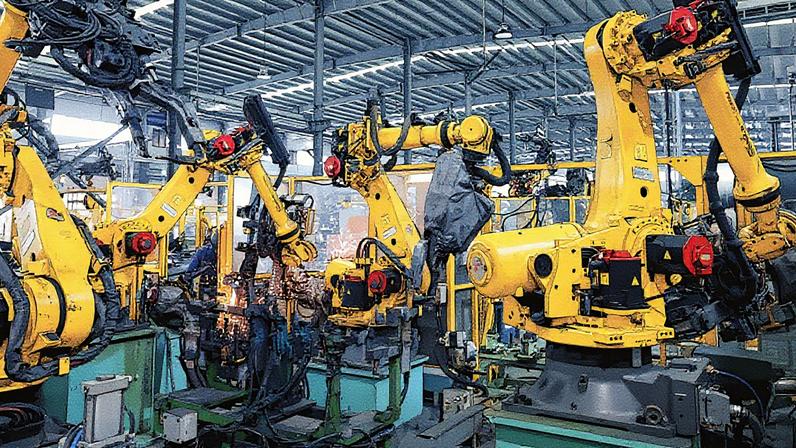 Robôs fabricam peças automotivas em uma fábrica em Ningde, China, em 17 de outubro de 2024. (Foto: Nurphoto | Nurphoto | Getty Images)