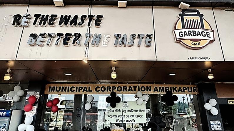 Ritesh Saini/ Ambikapur Municipal Corporation The front exterior of the cafe which has signs saying: [Mo]re the waste better the taste, Garbage Cafe and Municipal Corporation Ambikapur (Credit: Ritesh Saini/ Ambikapur Municipal Corporation)