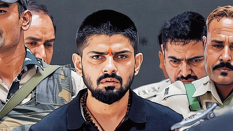 Police escort Lawrence Bishnoi at a court in New Delhi, India, on 18 April 2023. Photograph: Rahul Singh/ANI via Reuters