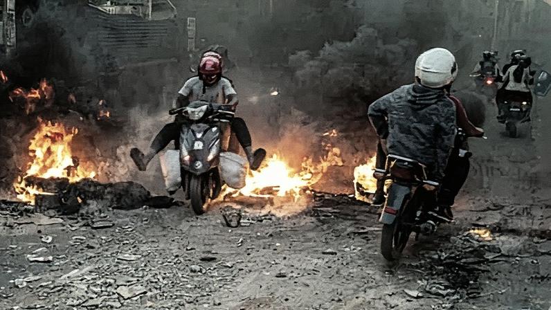 Police fired teargas to disperse the crowd after authorities declared a dusk-to-dawn curfew last week. Photograph: Henitsoa Rafalia/EPA