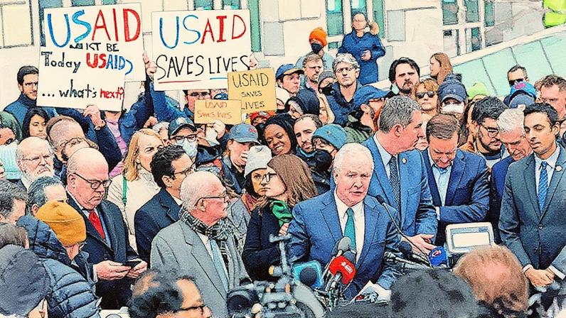 Congressistas americanos falam ao lado de funcionários e apoiadores da USAID em protesto fora da sede da agência em Washington (Foto: Reprodução)