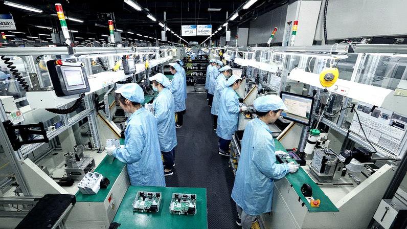 Fábrica em Suqian, China, com estrutura industrial visível (Foto: Reprodução)