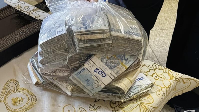 Notas de dinheiro apreendidas pela Polícia Civil durante operação contra pirâmide financeira (Foto: Reprodução)