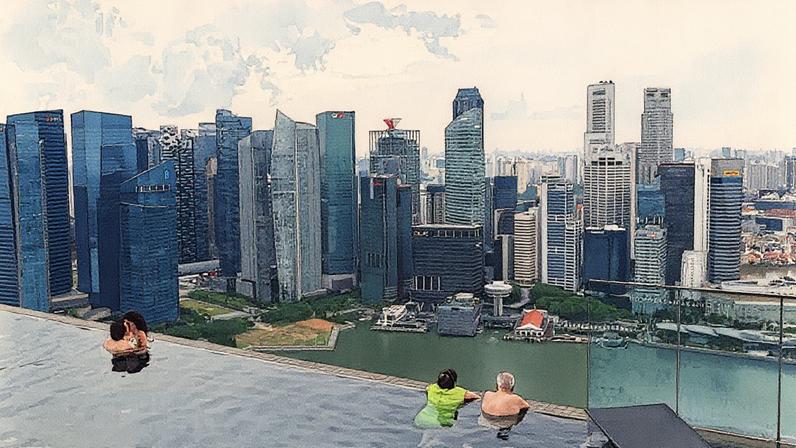 Vista da piscina na cobertura do hotel Marina Bay Sands, com o horizonte do distrito financeiro de Cingapura ao fundo (Foto: Reprodução)