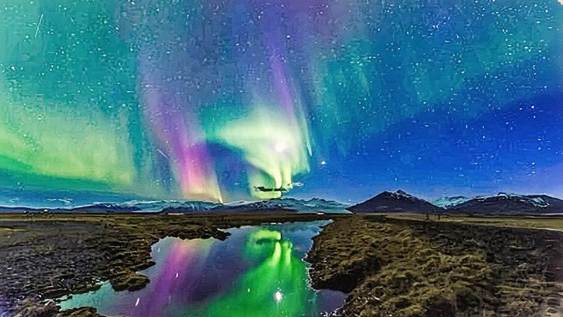 Aurora boreal ilumina o céu da Islândia com suas cores vibrantes (Foto: Reprodução)