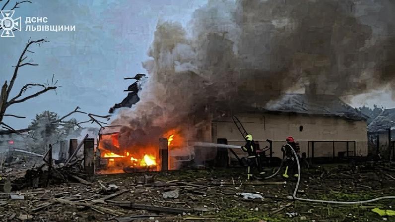 Firefighters battle a fire at a home in Lviv after heavy Russian bombardment in the region. Photograph: State Emergency Service Of Ukraine/Reuters