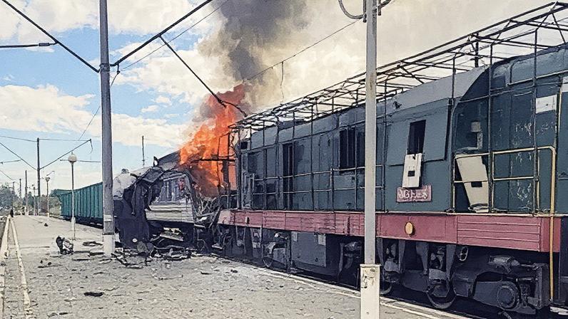 A wrecked train and smoke