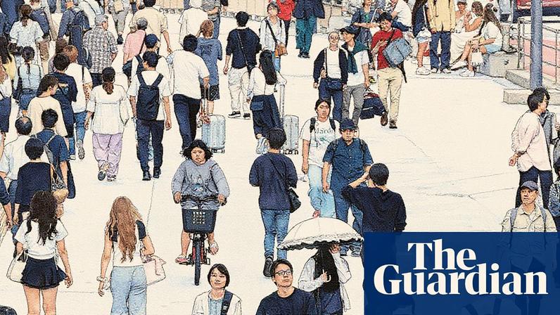 Pedestrians walk through a sidewalk at Shinjuku business and shopping district in Tokyo, Japan.