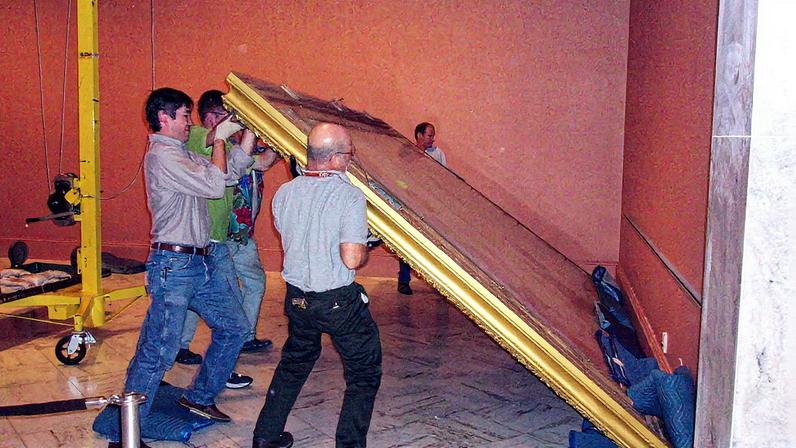 Workers at the Smithsonian American Art Museum moving a large Thomas Moran painting Photo courtesy Smithsonian American Art Museum, via Flickr