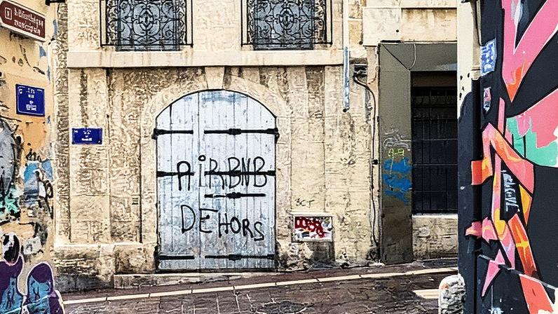 Anti-Airbnb graffiti in the Le Panier district of Marseille. Short-term rentals have been blamed across Europe for driving up rents and forcing local people out of city centres.