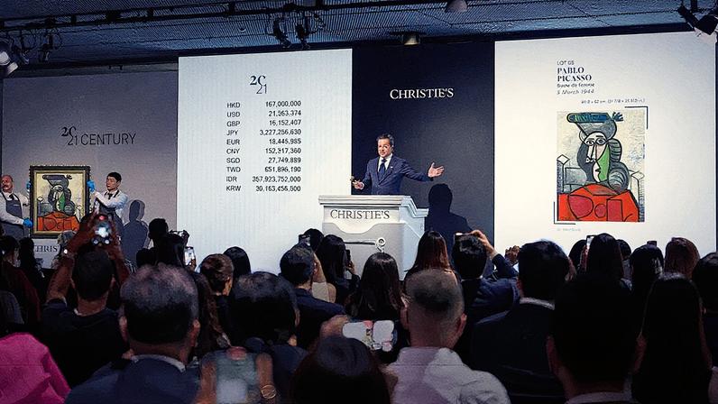 Picasso's 1944 painting Buste de Femme set his Asia record price at Christie's Hong Kong, hammering for HK$196.75m (US$25.4m)