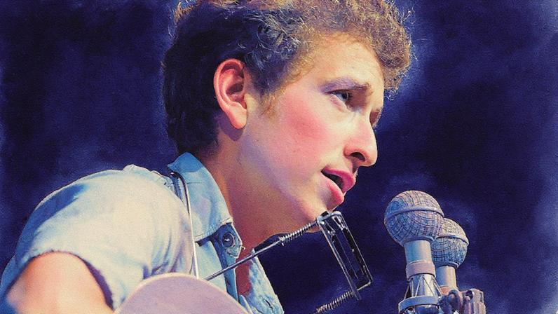 Close-up of American musician Bob Dylan as he plays acoustic guitar during a performance at the Newport Folk Festival, Newport, Rhode Island, July 1963.