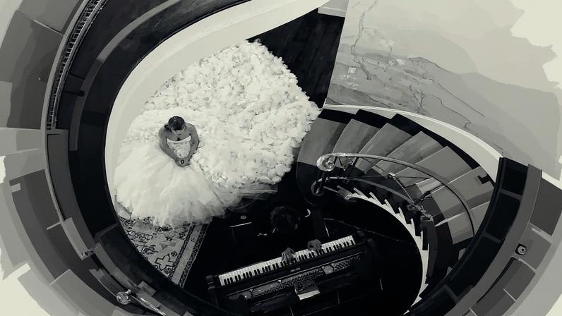 Taylor Swift wore a white Nicole + Felicia Couture wedding dress in her “I Bet You Think About Me” music video, released in 2021.