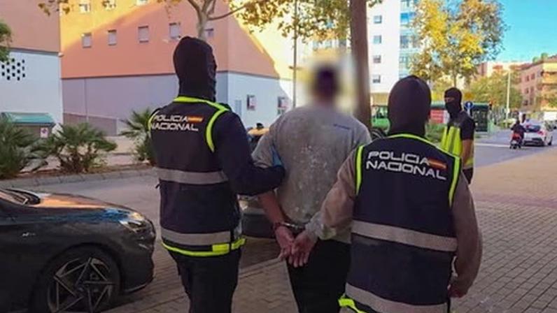The Spanish national police detain a suspect in the province of Castellón, on 1 December 2025. Photograph: Spanish National Police/AFP/Getty Images