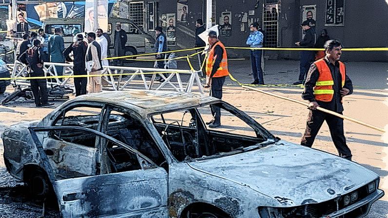 The interior minister said the attacker tried to ‘enter the court premises but, failing to do so, targeted a police vehicle’. Photograph: Mohammad Yousuf/AP