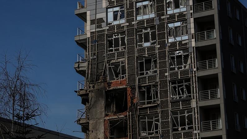 A residential building damaged by a Russian strike on Kyiv. Moscow has continued its nightly attacks on Ukrainian cities will peace talks proceed.