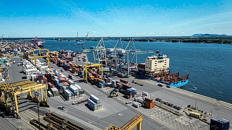 Shipping containers are stacked at the Port of Montreal in Montreal, Quebec, Canada, on 01 August 2025. Photograph: Andrej Ivanov/AFP/Getty Images