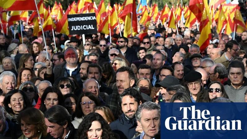 Politicians and protesters attend a demonstration called by the conservative People’s party (PP ) in Madrid on Sunday.