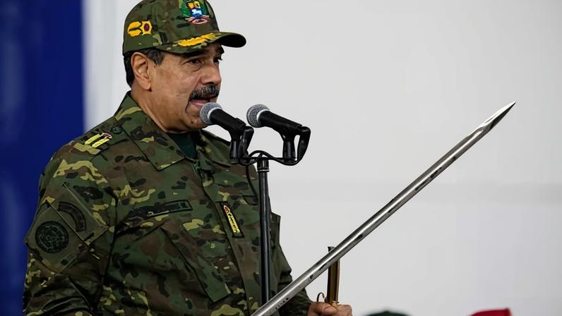President Nicolás Maduro holds a ceremonial sword said to have belonged to independence hero Simón Bolívar at an event in Caracas on Tuesday.