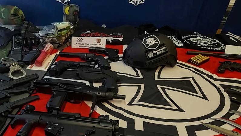 Weapons and paraphernalia seized by Spanish police as part of an investigation into the Base that has also led to three arrests.