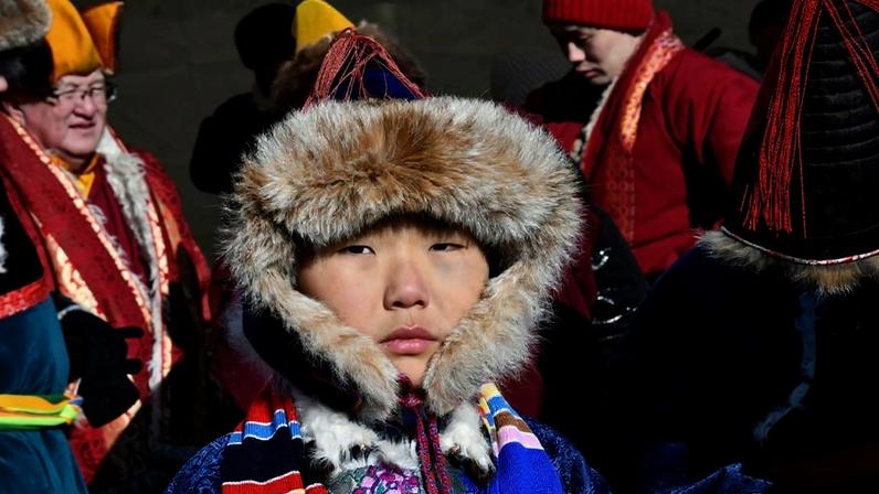 People take part in Mongolian Lunar New Year celebrations in Aga Buryatia, Russia.