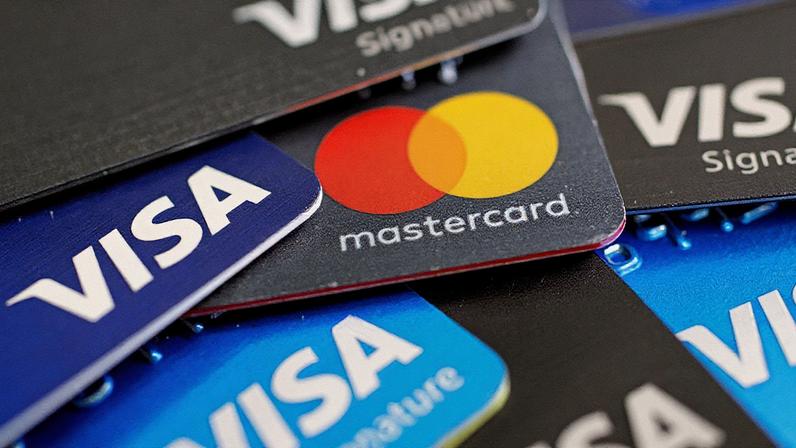 Visa e Mastercard chegam a acordo com o varejo nos EUA para reduzir parte das taxas | (Bloomberg/Daniel Acker)