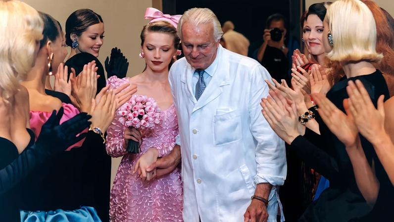 Hubert de Givenchy and Angelica Boss walking the runway at the fall 1995 Couture show, the designer’s final bow. Getty Images