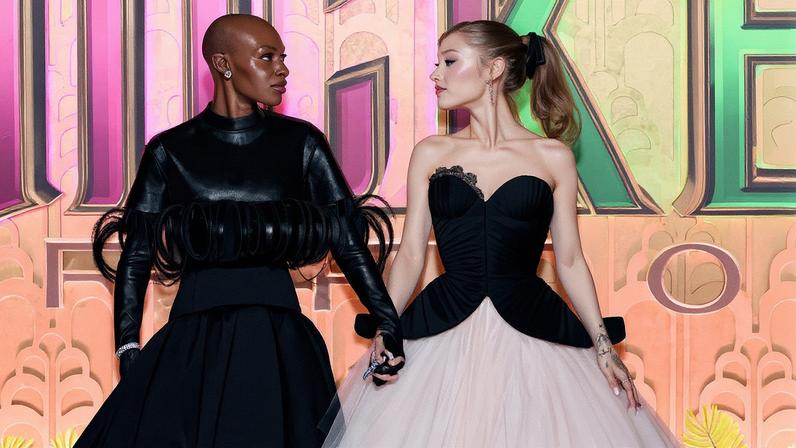 Ariana Grande broke down why she and Cynthia Erivo “like to touch each other.” Getty Images