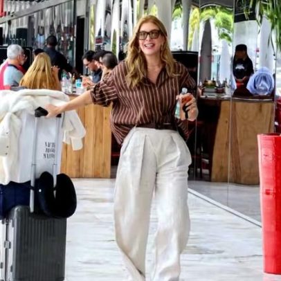 Lore Improta, grávida, desembarca no RJ e faz pausa para se alimentar