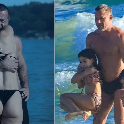 Malvino Salvador e Kyra Gracie são fotografados na praia em clima descontraído